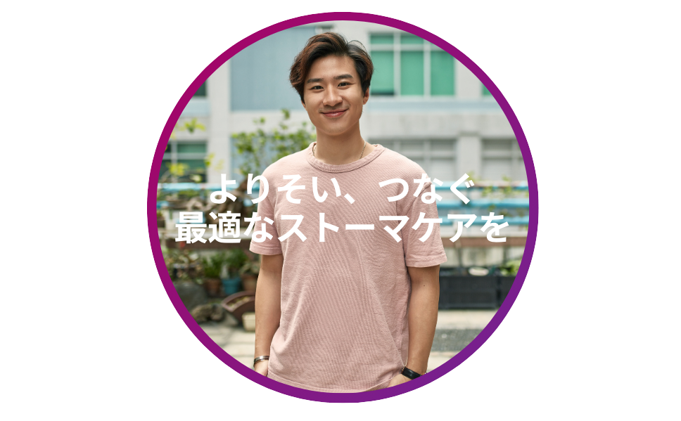 ピンクのシャツを着た人