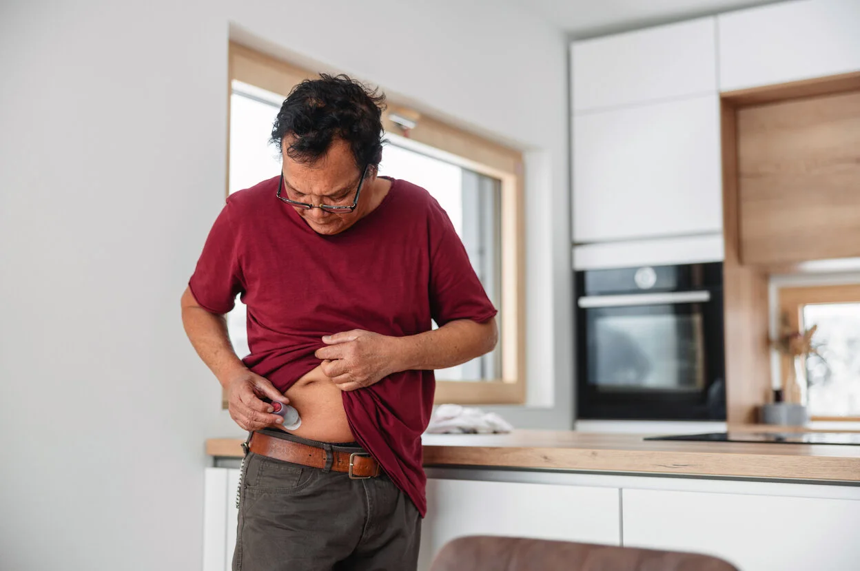 a man wearing a red shirt