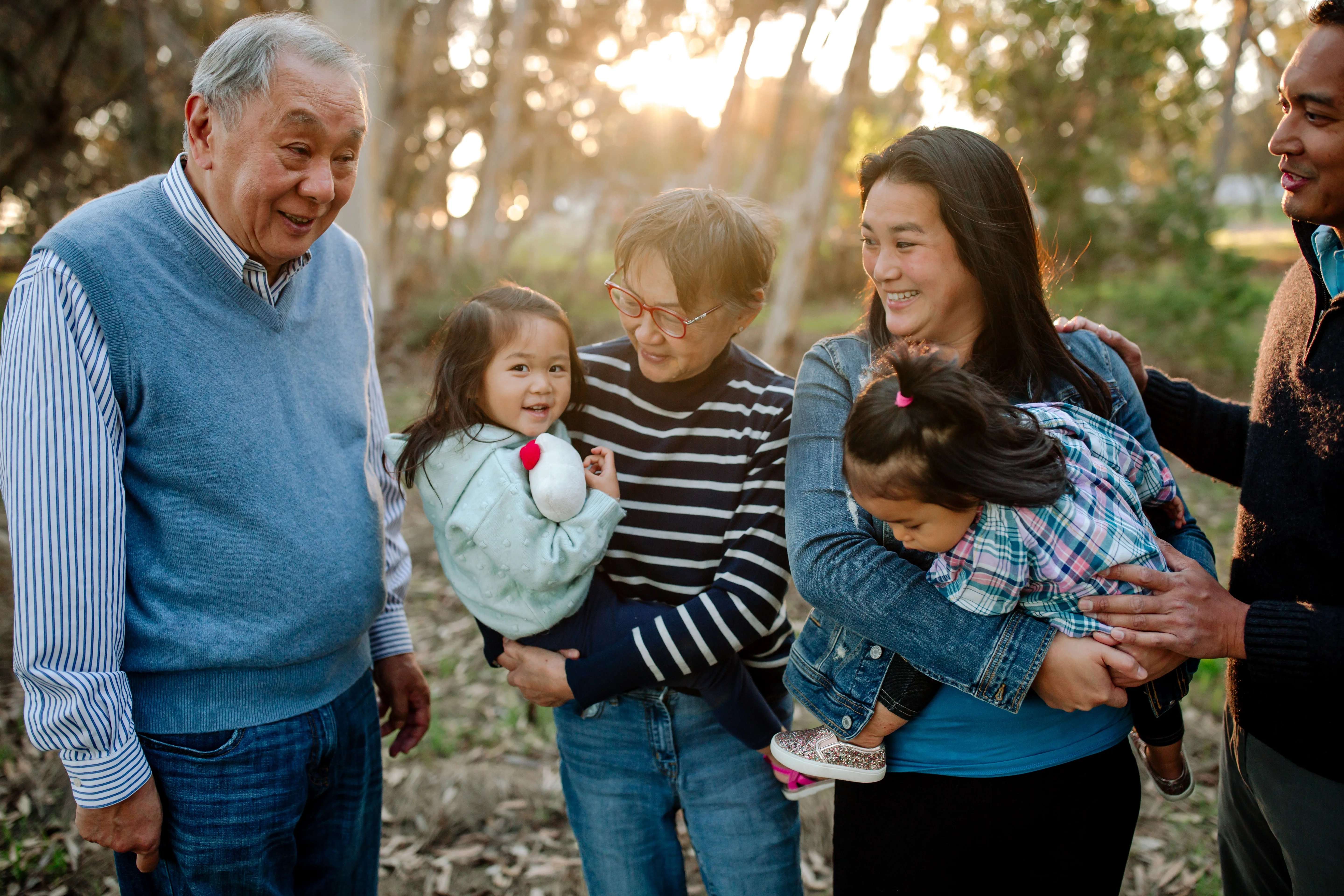Family outside with children