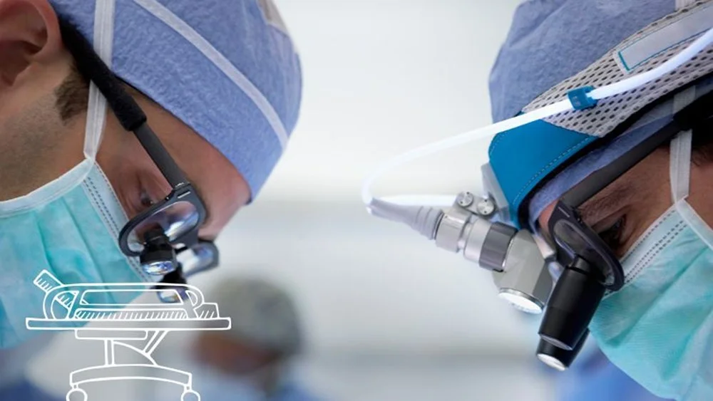 a close-up of two surgeons